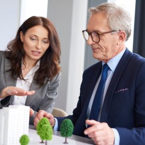 business-couple-architectural-model_329181-19318